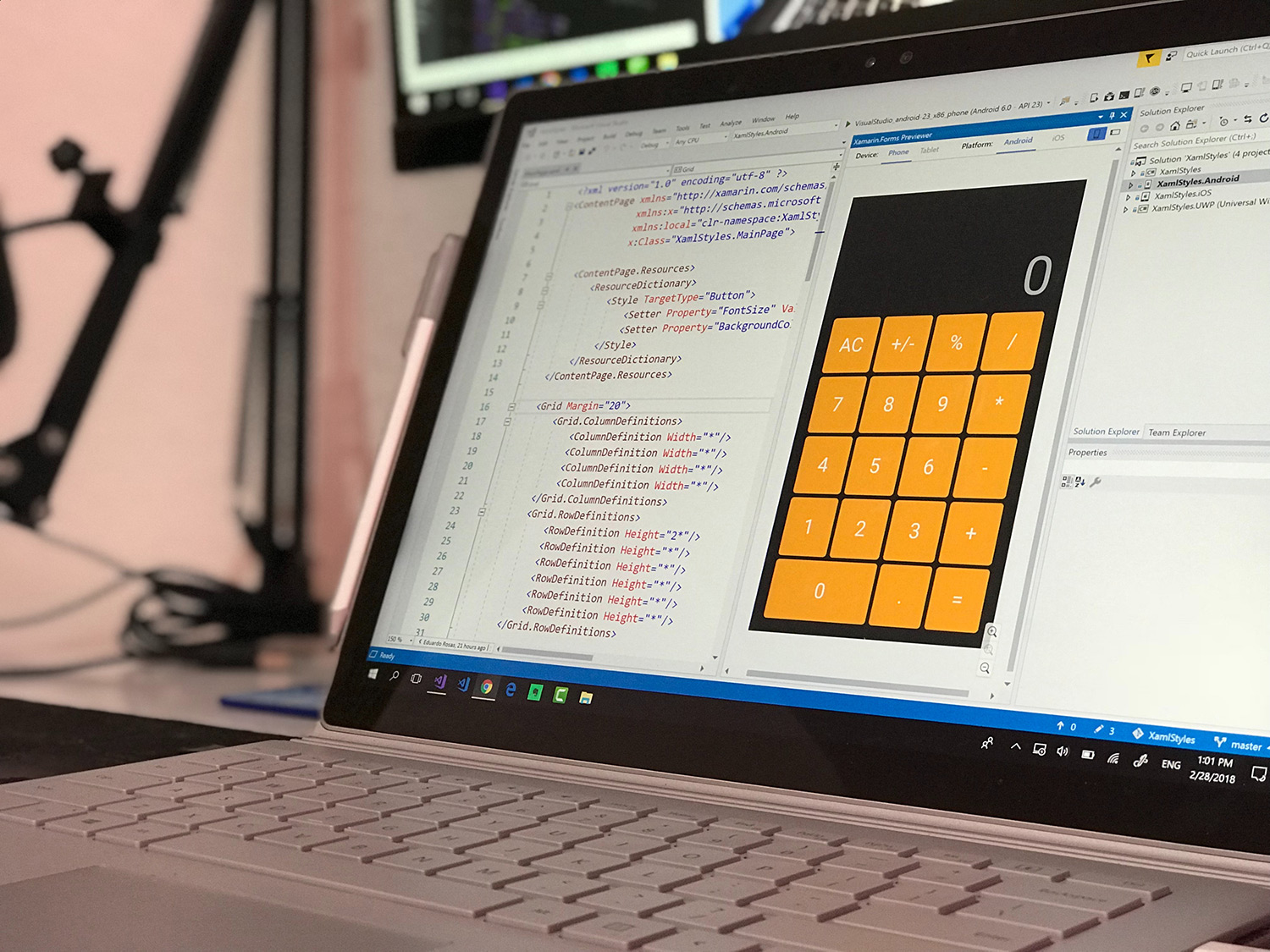 A laptop with a calculator on the screen